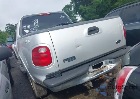 2002 Ford F-150 Lariat/Xlt z USA, uszkodzony, nr VIN 1FTRW08L62KC77375